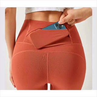 Leggings SuperMesh arancioni con tasca e portatelefono integrati