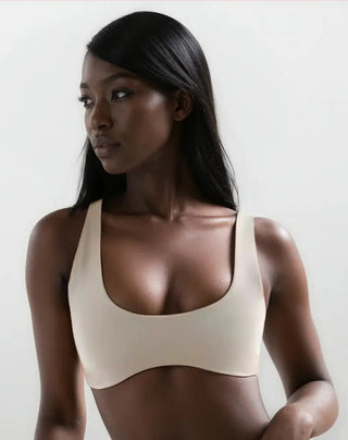 Reggiseno sportivo beige senza cuciture con design a reggiseno e spalline regolabili