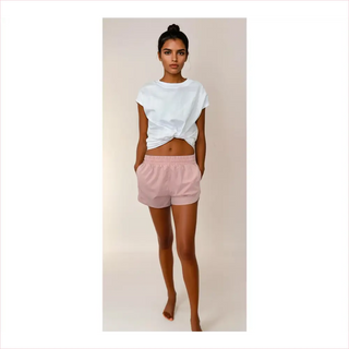 Shorts da corsa United rosa cipria in cotone con elastico e tasche
